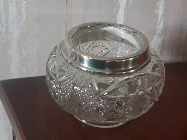 antique silver topped glass jar