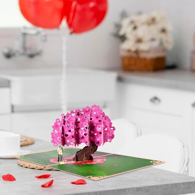Biglietto Di S. Valentino, Cartolina D'auguri Con Tricottare Le Coppie Nell'amore E Dorato
