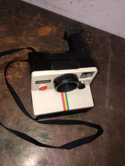 Cámara terrestre instantánea Polaroid de un paso a rayas arco iris vintage