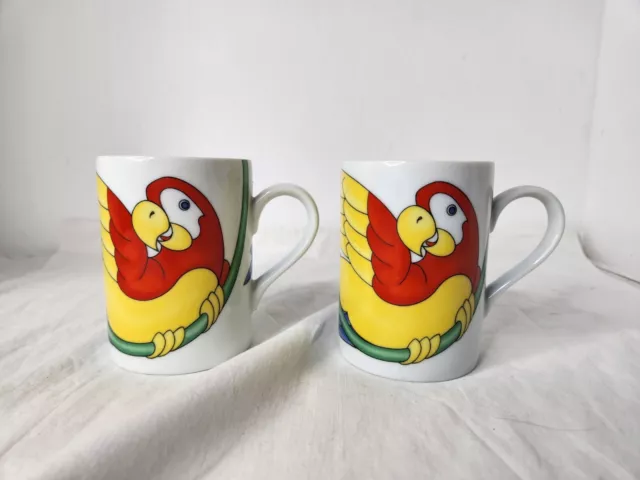 TWO Vintage Fitz and Floyd coffee mug cup Parrot-in-Ring Red Blue Yellow 1979