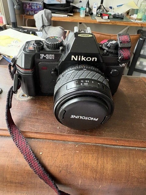 Appareil photo reflex argentique Fujica STX-1 35 mm avec objectif X-Fujinon f/2.2 55 mm et convertisseur. - Canada
