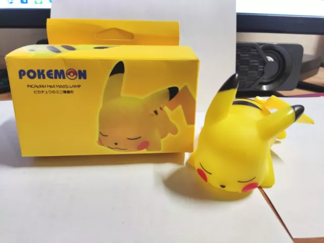 Pokemon Luce Notturna + Box Pikachu Versione 1