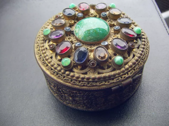 Antique Austrian Jeweled Box Glass Cabochon Stones Filigreed Gilt Brass Round