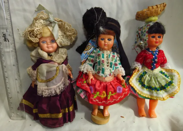 3 small child costume dolls
