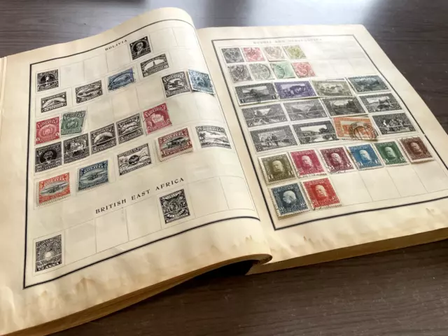 US/WW, BRITISH COLONIES, 2000+ Stamps hinged in an old Scott Modern album