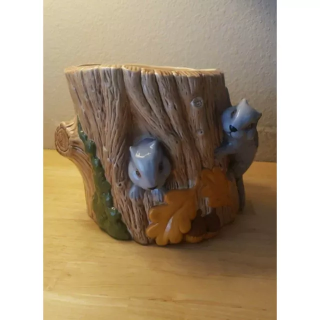 Squirrels on a hollow tree stump vintage ceramic container