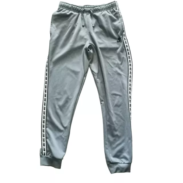 Nike tape poly joggers grey hotsell
