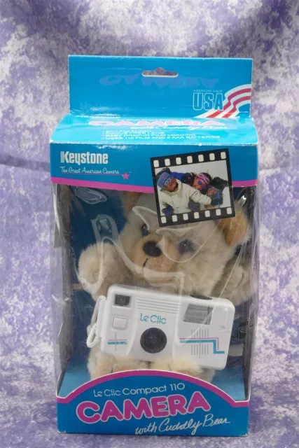 Cámara Keystone Le Clic 110 con oso cariñoso (oso de peluche) en paquete