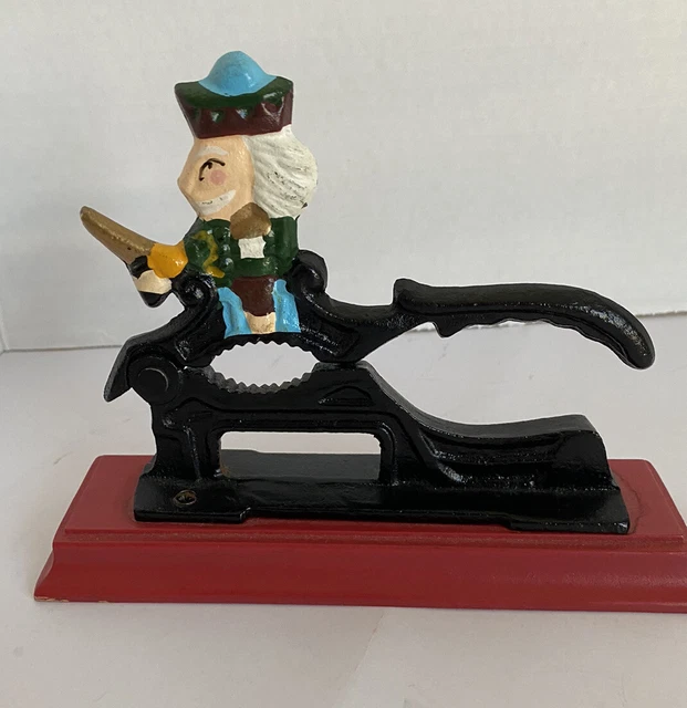 Nut Cracker Cast Iron Metal  on Wood Base Christmas Nutcracker Soldier L7.5" H6"