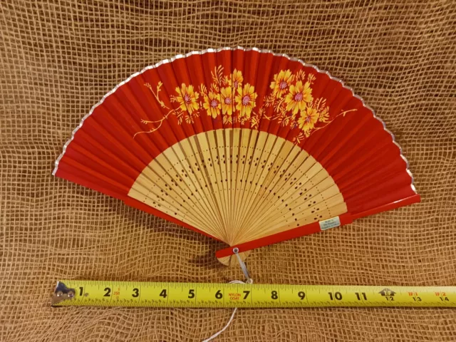 Red Chinese hand fan; silk, wood; flowers