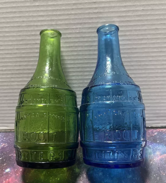 One Green And One Blue Root Bitters Bottles