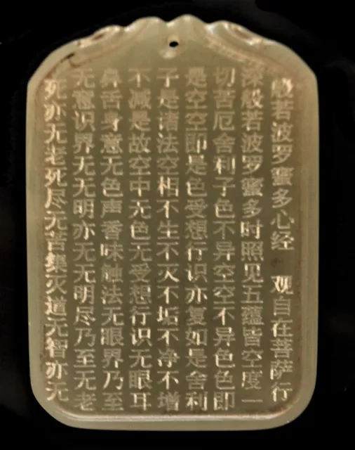 a Chinese carved jade plaque with Buddhism text in Chinese characters as pendant