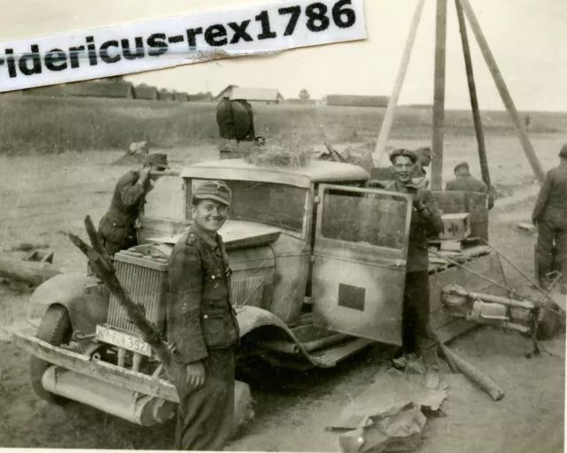 E60 photo GrenRgt503 eastern front retreat Minsk Vilnius Lithuania loot truck accident wheel