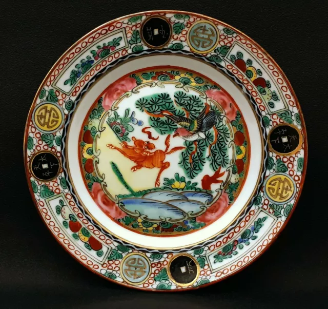 Old Chinese porcelain plate decorated by hand