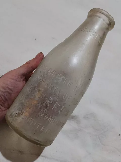 Quart Express Dairy London Area Two Pint Sized Wide Mouth Milk Bottle.