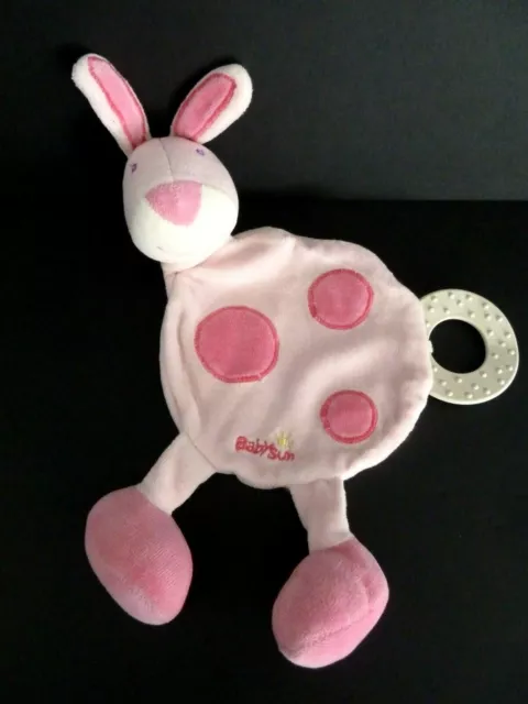 O5. Doudou Plat Babysun Lapin Rose Rond Plaque Dentition Blanc Grelot Tbe