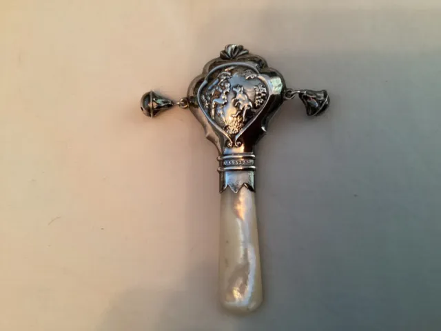 A Silver And Mother Of Pearl Teething Rattle And Stick By Adie & Lovekin Ltd