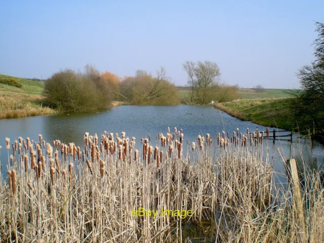 Photo 6x4 Fish pond fed by the headwaters of the River Devon A fish pond  c2009