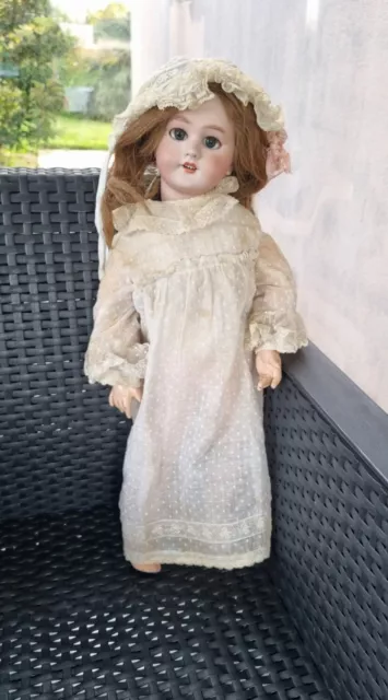 Antique bisque  doll french  tête jumeau 20 inches.