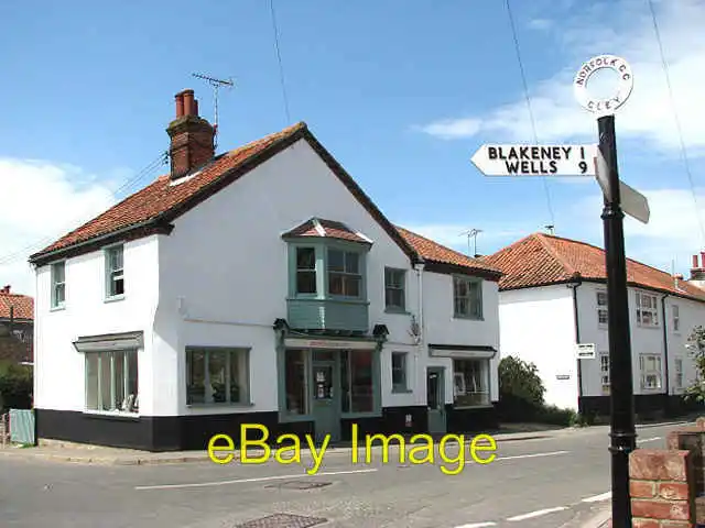 Photo 6x4 Sharp bend and a change of name Cley next the Sea Here New Road c2008