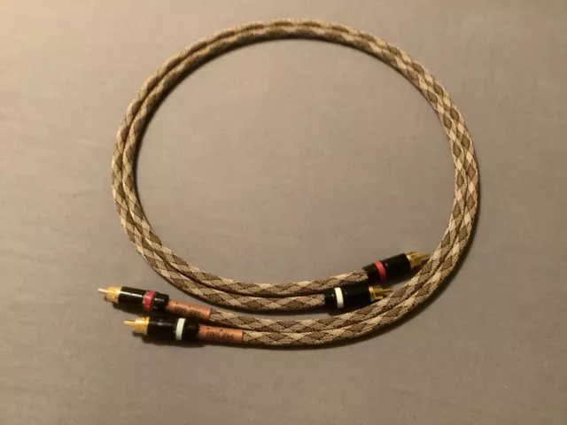 One pair of rca cables made with mogami 2549 and rean connectors snake color.