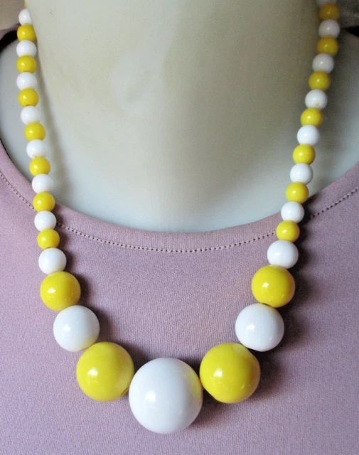 Colliers et pendentifs fantaisie jaunes en perle