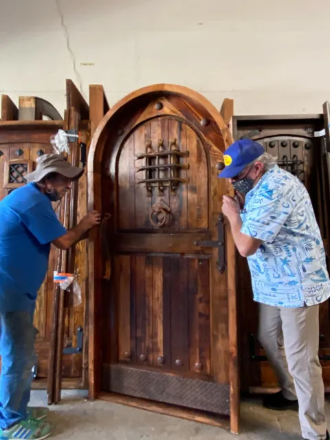 Rustic reclaimed lumber arched door solid wood storybook castle winery speakeasy 7