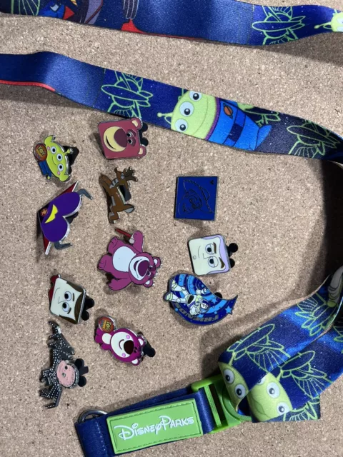 lot of 11 toy story disney pins and lanyard