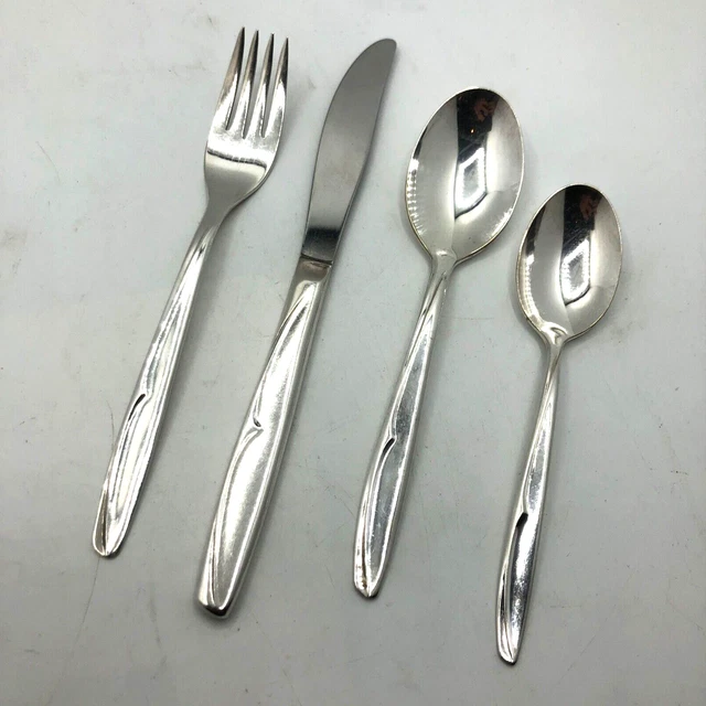 Supreme silver deals plate spoon