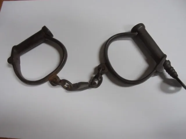 Antique circa 1900 policemans iron handcuffs with key