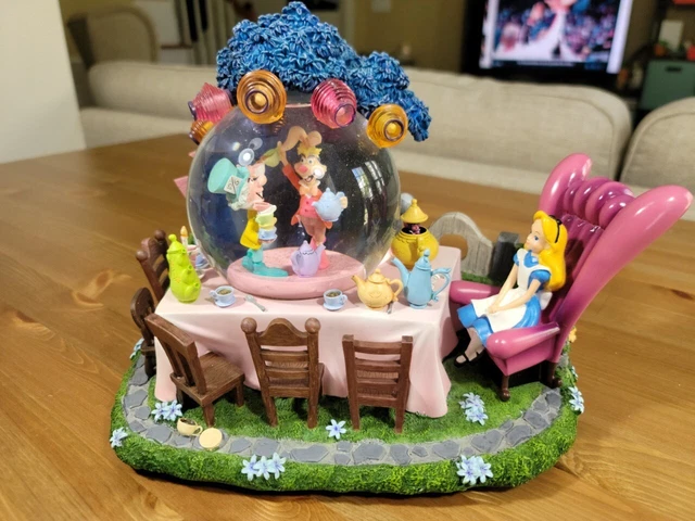Disney Alice in Wonderlan All in a Golden afternoon snowglobe Rare Disney Alice in Wonderlan All in a Golden afternoon snowglobe Rare