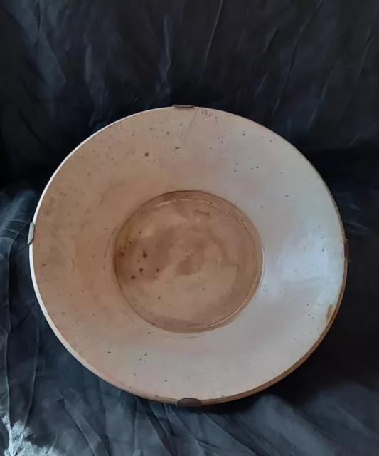 Old Chinese bowl on metal hanging bracket