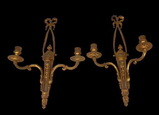 Antike Kerzenwandleuchten ein Paar vergoldetes Metall französisches Reich