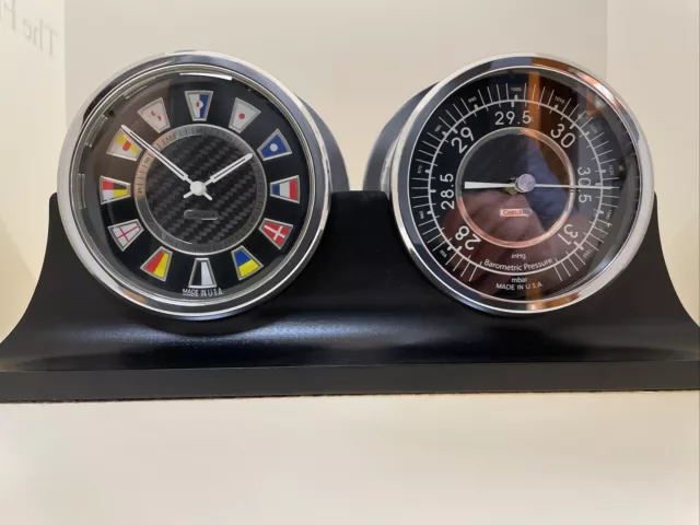 Chelsea Black Flag Clock and Barometer set In Chrome on a Black Wood Base.