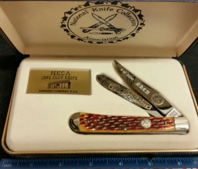 Sargent USA by Queen 1992 NKCA Club Trapper knife, jigged brown bone handles  ^