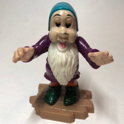sleepy dwarf figurine
