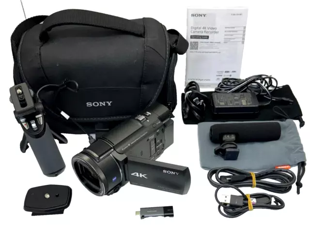 Sony FDR-AX53 4K Ultra HD Handycam Camcorder Video Camera + Mic & Tripod in Bag