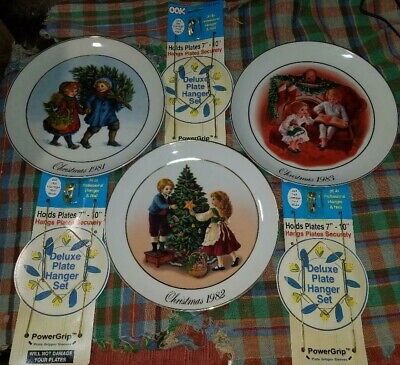 3 Avon 'Christmas Memories' Collector Plates w/new wall hangers 22K Gold Trim