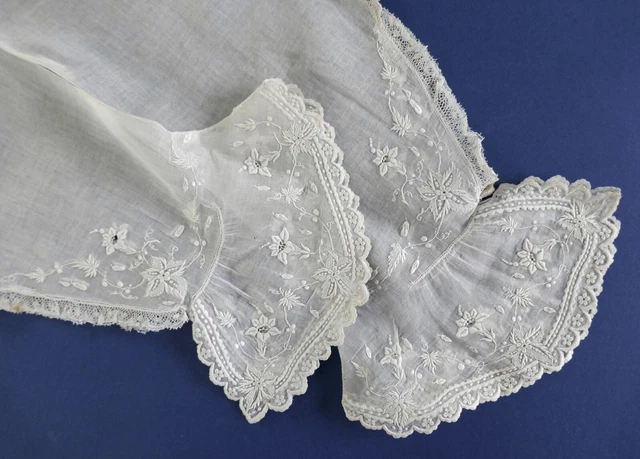 A PAIR OF 19th CENTURY HAND EMBROIDERED MUSLIN ENGAGEANT OR UNDER SLEEVES
