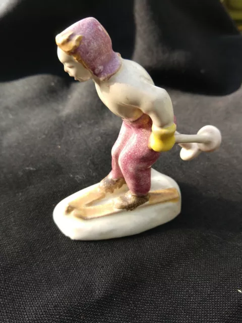 Antique Vintage Ceramic Laughing Young Girl Hand Painted Skier Figurine Skis
