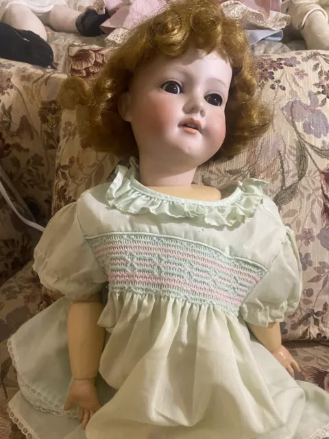 A Henri Rostal Mon Trésor bisque head musical pull-along doll, French circa  1914