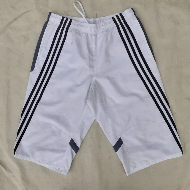 Pantaloncini adidas fino al ginocchio cheap