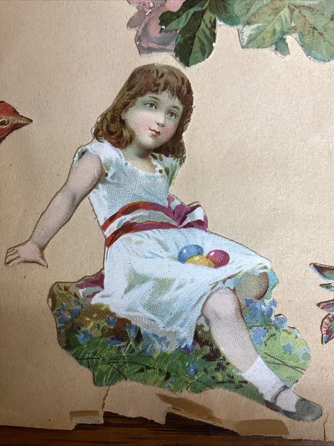 Página de libro de recortes troquelada de colección del siglo XIX con tarjetas victorianas y troquelados en ambos lados