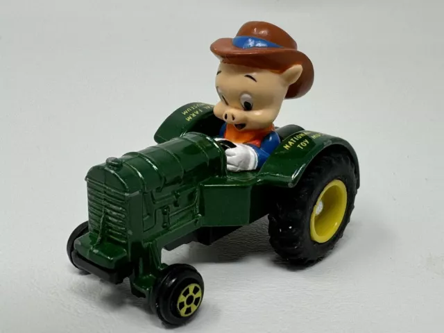 ERTL Toy Museum 1989 Edition PORKY PIG on John Deere