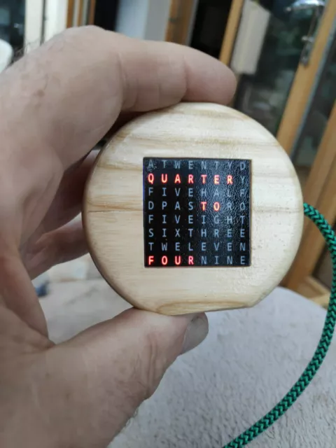 Miniature word clock set in turned Irish hardwood