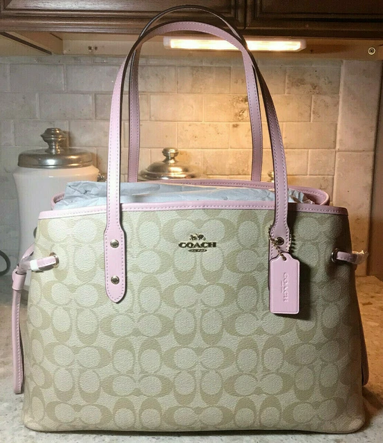 Drawstring carryall in signature canvas coach deals