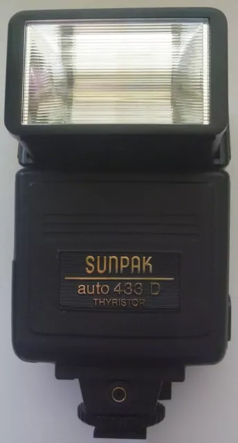 SUNPAK auto 433 D thyristor flash dedicated for Minolta SLR cameras. JAPAN