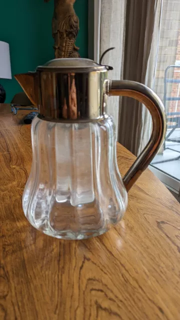 Antique Edwardian Clear Glass Lemonade jug complete with ice tube in center .