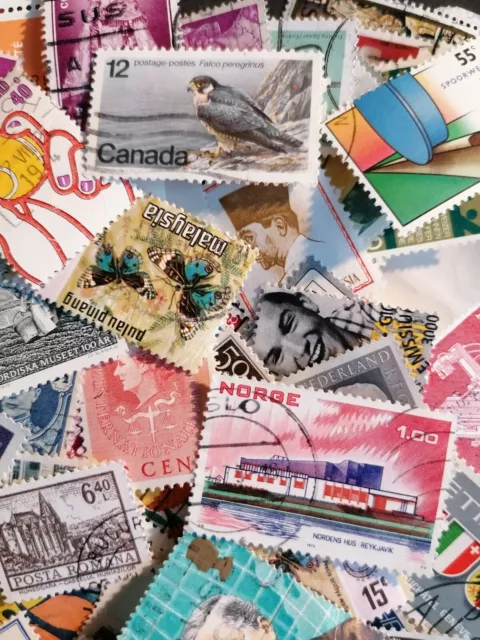 100 World  Wide postage stamps. Randomly selected World post stamps. Timbres.