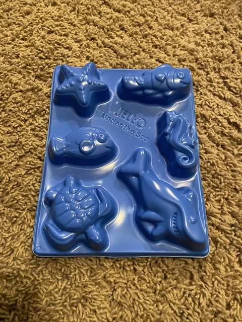 Disparos de jigglers de gelatina molde bajo el mar tiburón, tortuga, peces, estrellas de mar y caballito de mar